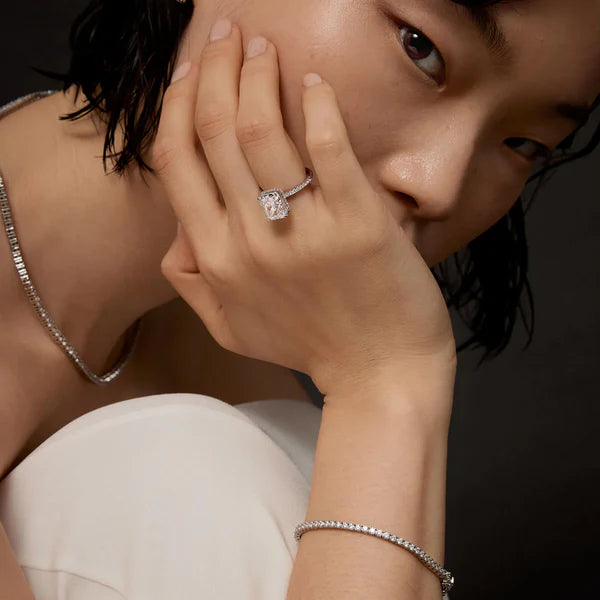 radiant cut solitaire with half eternity band