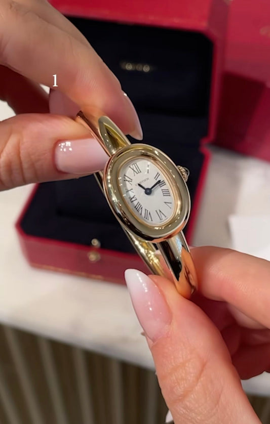 Gold Bangle Watch with Oval Face: The Elegant Jewelry Watch Every Woman Needs