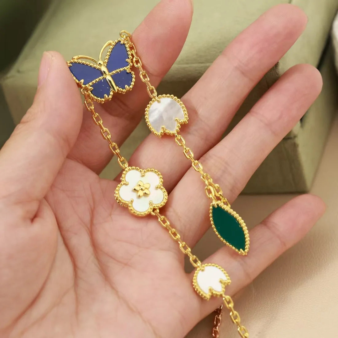 Lucky Butterfly & Clover Charm Bracelet – Gold-Tone Multi-Stone Bracelet