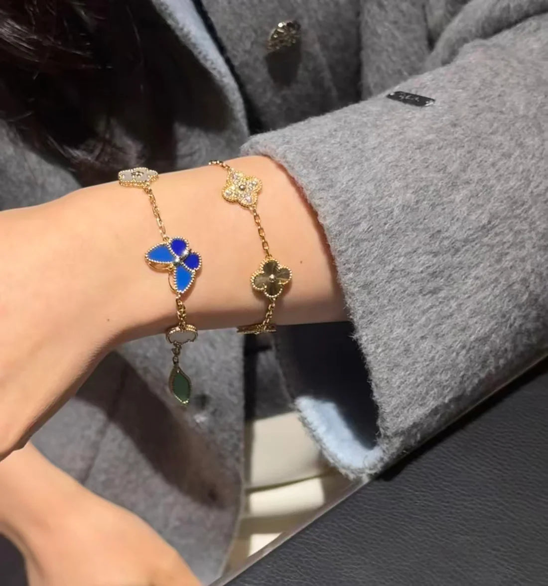 Lucky Butterfly & Clover Charm Bracelet – Gold-Tone Multi-Stone Bracelet