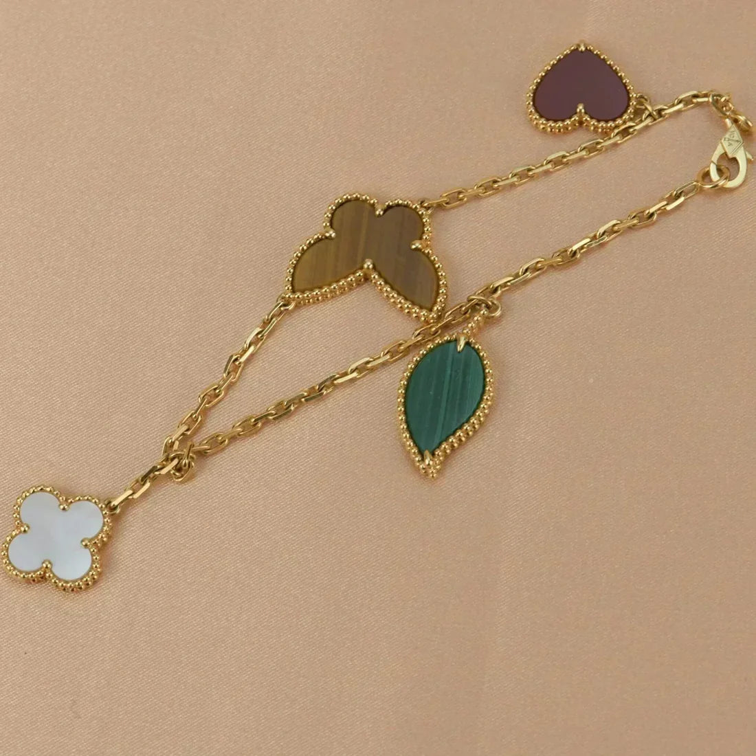 Lucky Butterfly & Clover Charm Bracelet – Gold-Tone Multi-Stone Bracelet