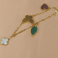 Lucky Butterfly & Clover Charm Bracelet – Gold-Tone Multi-Stone Bracelet