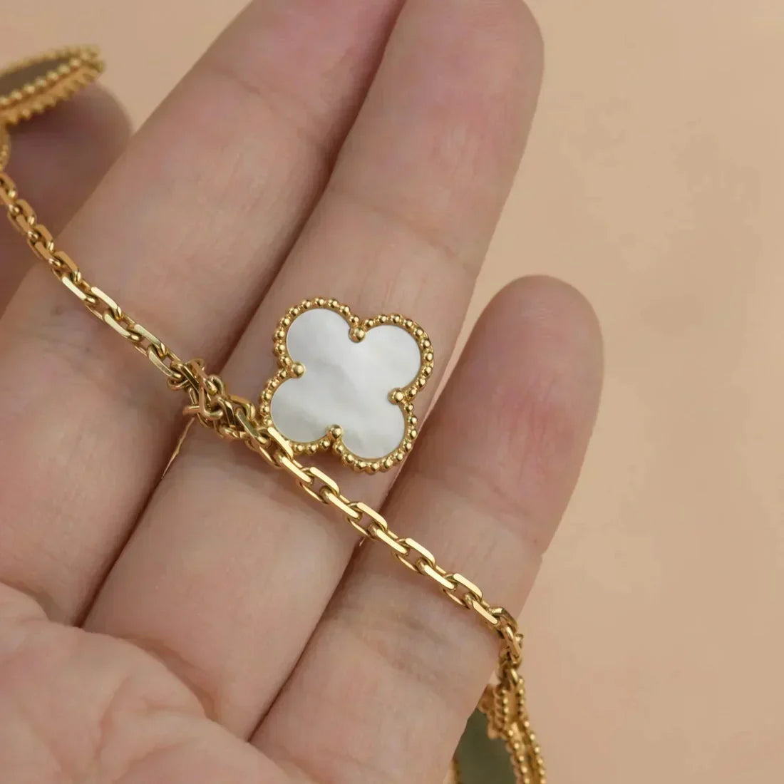 Lucky Butterfly & Clover Charm Bracelet – Gold-Tone Multi-Stone Bracelet